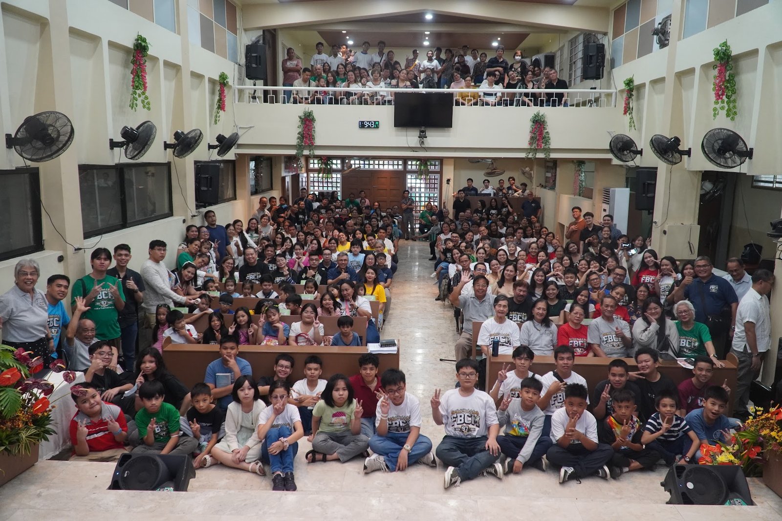 The congregation filling the church hall